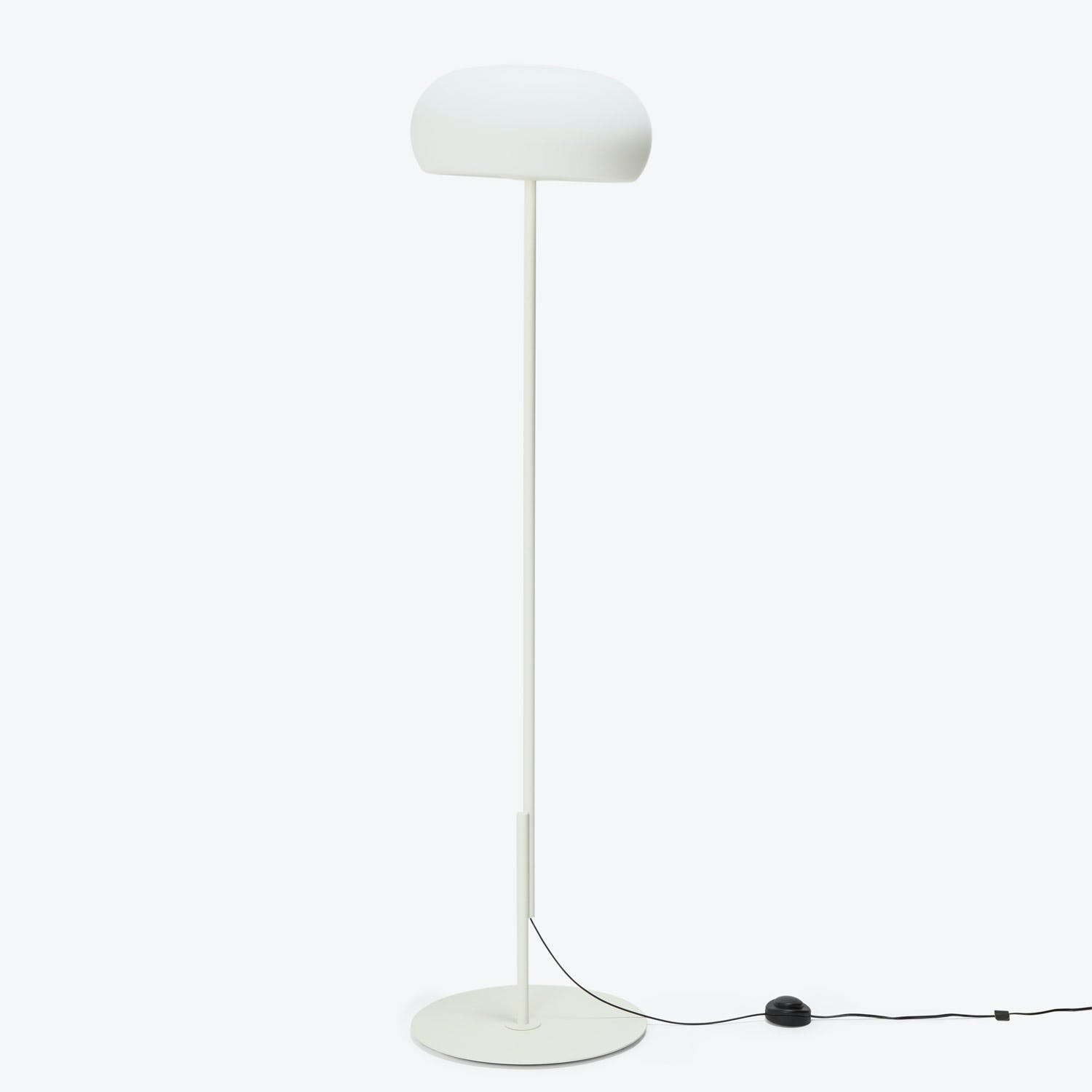 Modern minimalist floor lamp with sleek white design and oval shade.