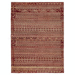 Intricately woven traditional rug featuring symmetrical geometric patterns in earthy tones.