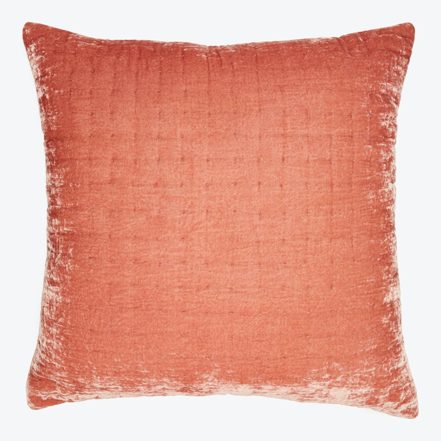 Vintage-style square cushion with textured surface in pink/coral color.
