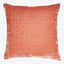 Vintage-style square cushion with textured surface in pink/coral color.