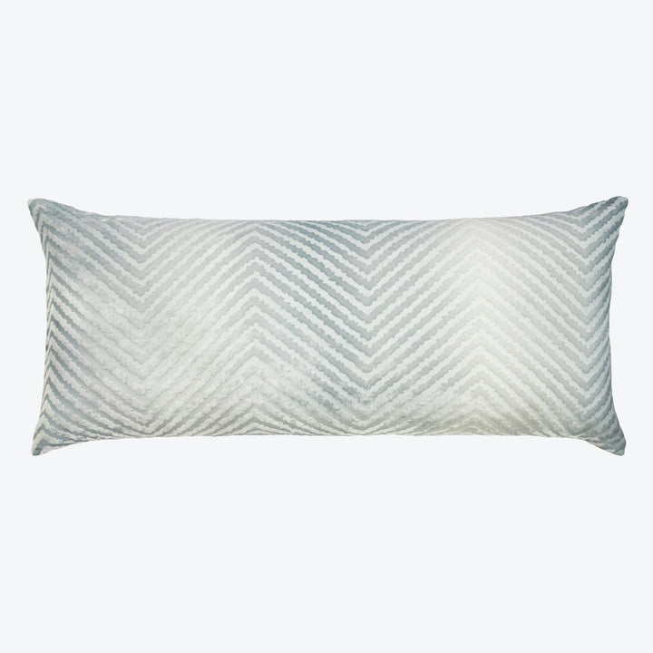 Rectangular pillow with chevron pattern in shades of grey and white