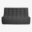 Modern dark grey loveseat with tufted upholstery and clean lines.