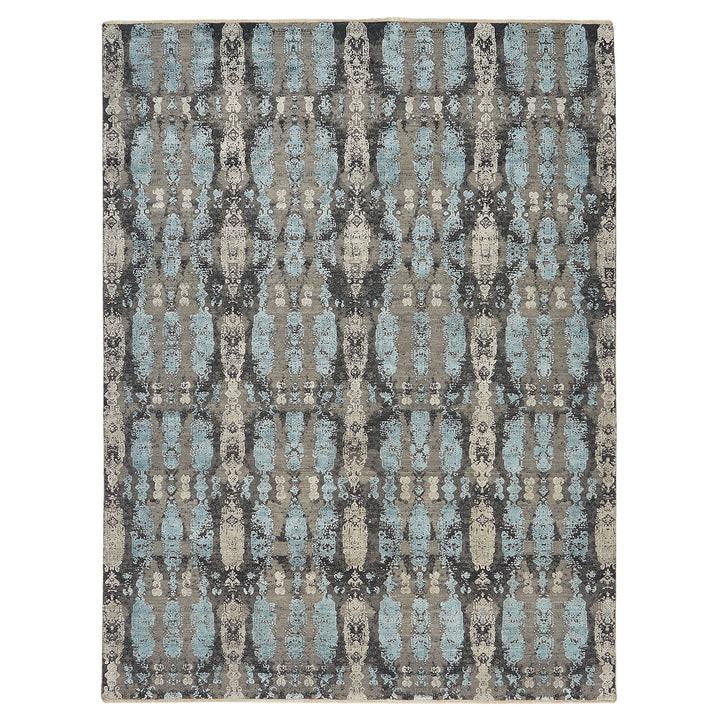 Vintage-inspired rectangular rug with distressed pattern in shades of gray