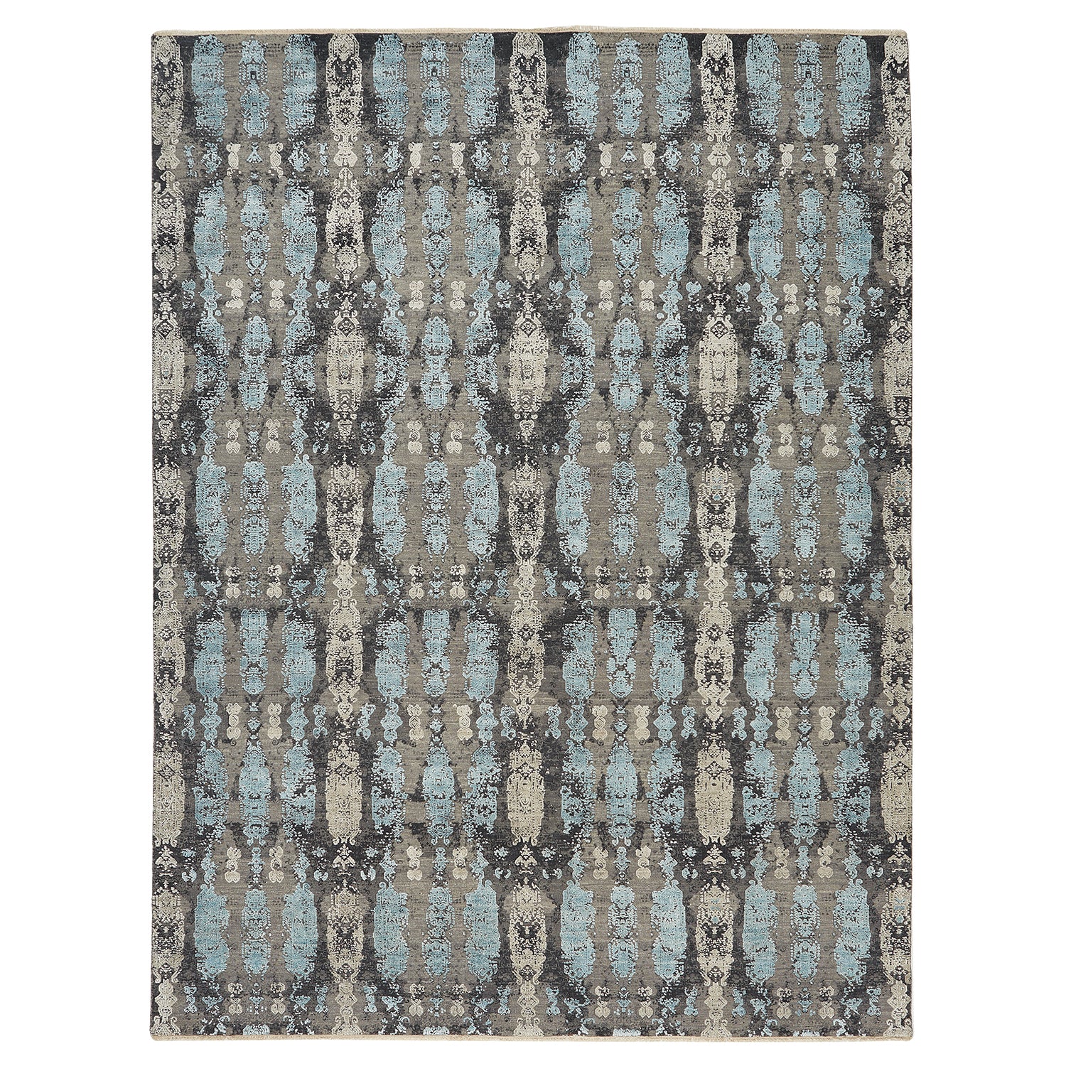 Vintage-inspired rectangular rug with distressed pattern in shades of gray