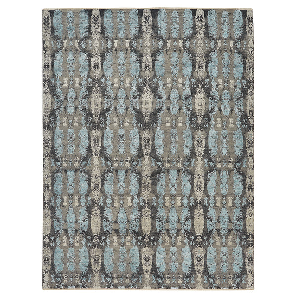 Vintage-inspired rectangular rug with distressed pattern in shades of gray