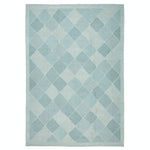 Contemporary diamond-patterned rug in shades of blue creates a calming atmosphere.