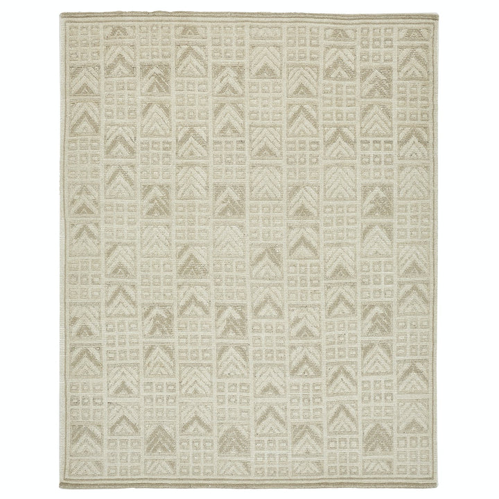 Rectangular rug with geometric pattern in monochromatic beige tones.