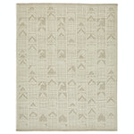 Rectangular rug with geometric pattern in monochromatic beige tones.