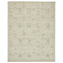 Rectangular rug with geometric pattern in monochromatic beige tones.
