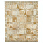Textured rug with intricate geometric pattern in neutral earth tones.