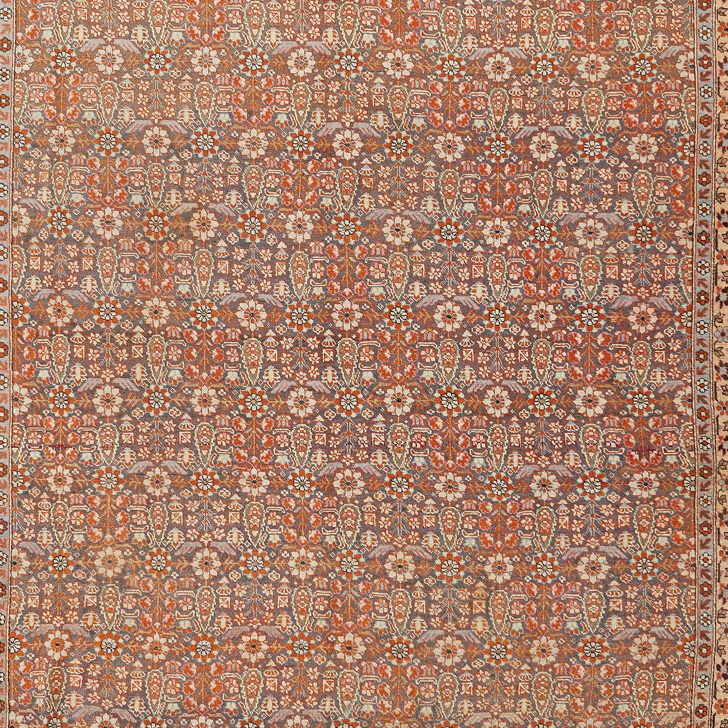 Exquisite traditional carpet showcases intricate design, warm tones, and fine craftsmanship.