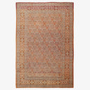 Intricately designed handmade rug with Persian-inspired motifs and warm tones.