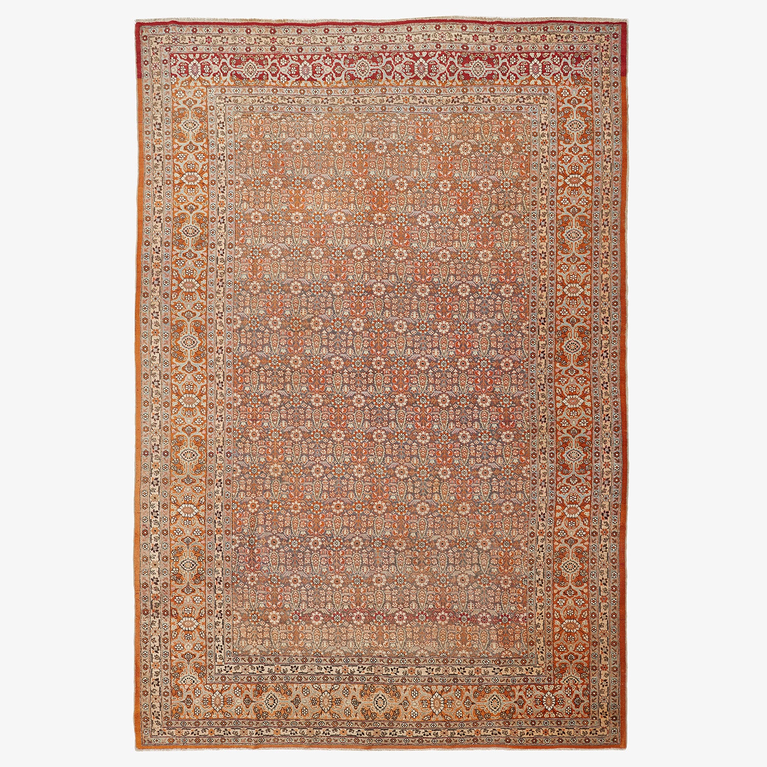 Intricately designed handmade rug with Persian-inspired motifs and warm tones.