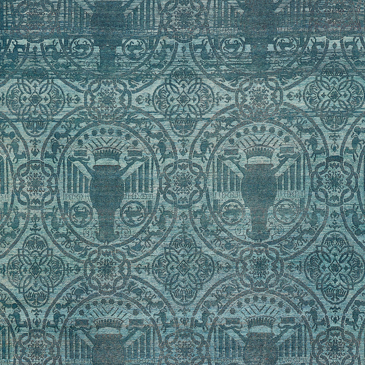 Intricate blue and gray mosaic depicts symmetrical patterns with floral designs.