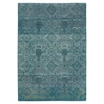 Intricate vintage rug with circular motifs creates a balanced design.