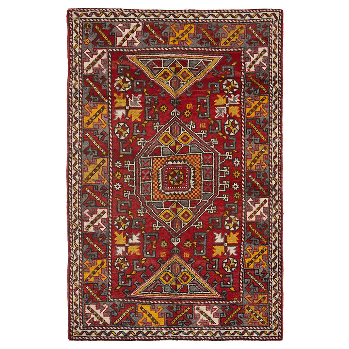 Exquisite hand-woven rug with intricate geometric patterns in rich colors.