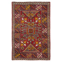 Traditional handmade rug with intricate geometric design and rich color.