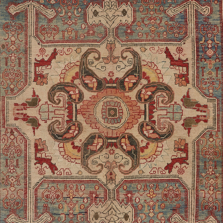 Exquisite hand-woven rug showcases intricate geometric and floral patterns.