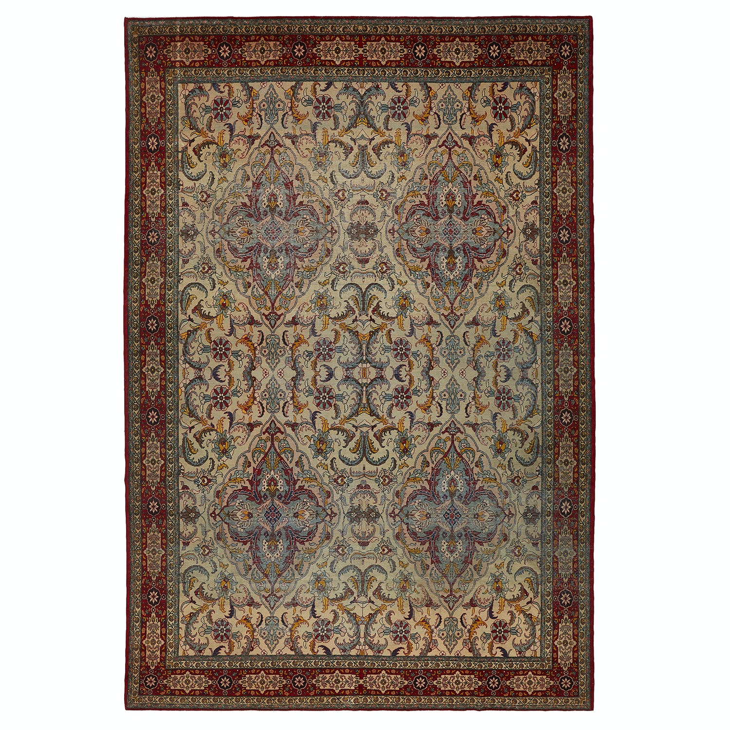 Ornate, symmetrical rug with intricate floral motifs in muted colors.