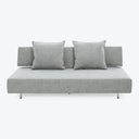 Modern grey sofa with clean lines and minimalist design aesthetic.