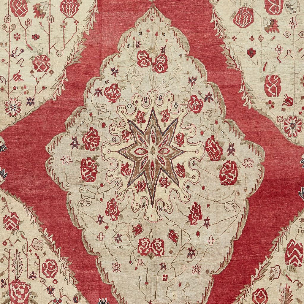 Intricate red and beige textile showcases traditional Middle Eastern craftsmanship.