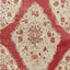 Intricate red and beige textile showcases traditional Middle Eastern craftsmanship.