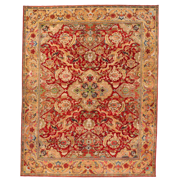 Hand-knotted Persian rug with intricate floral and foliate motifs.