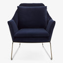 Modern dark blue armchair with plush upholstery and sleek frame.