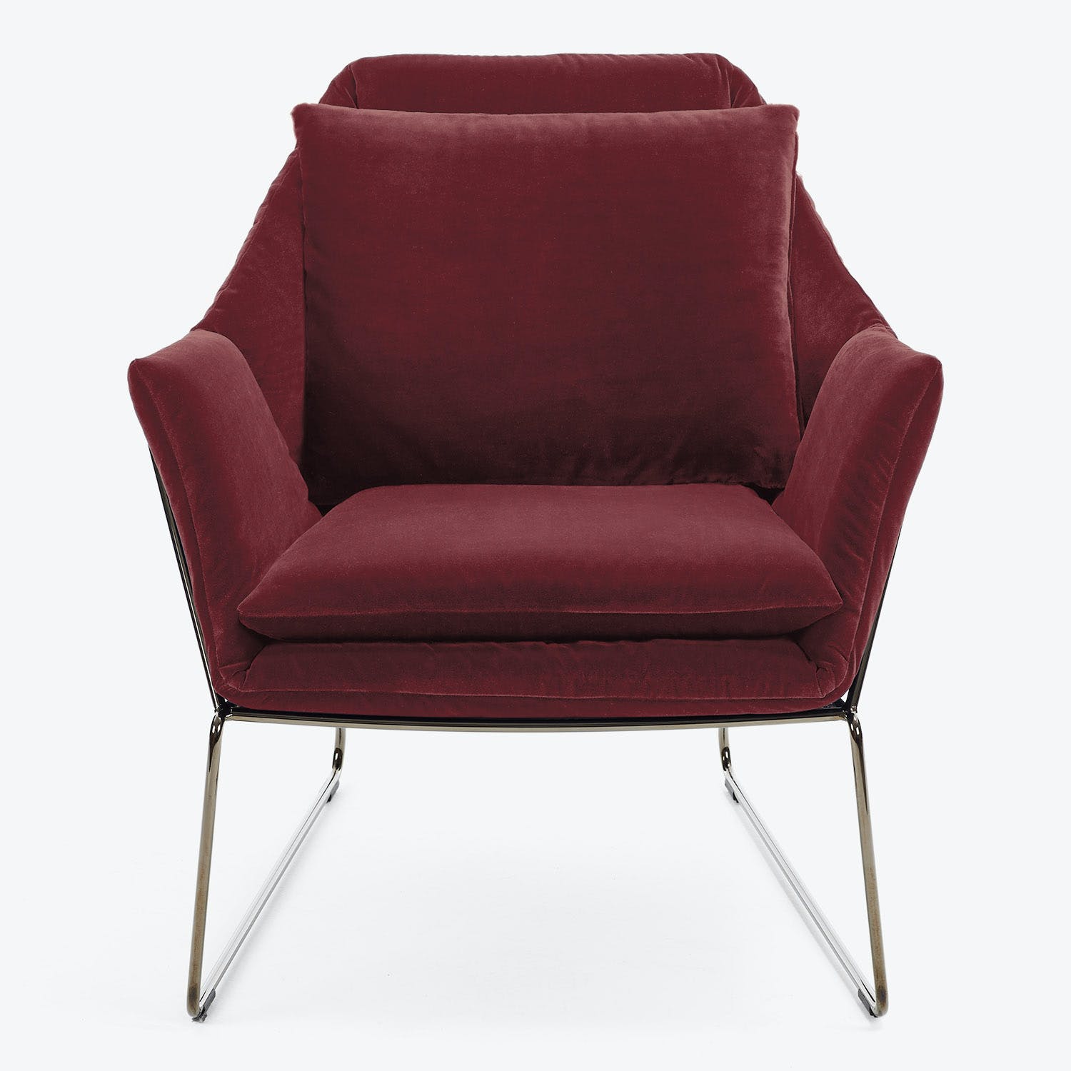 Contemporary single-seat armchair with plush red velvet upholstery and sleek metal frame