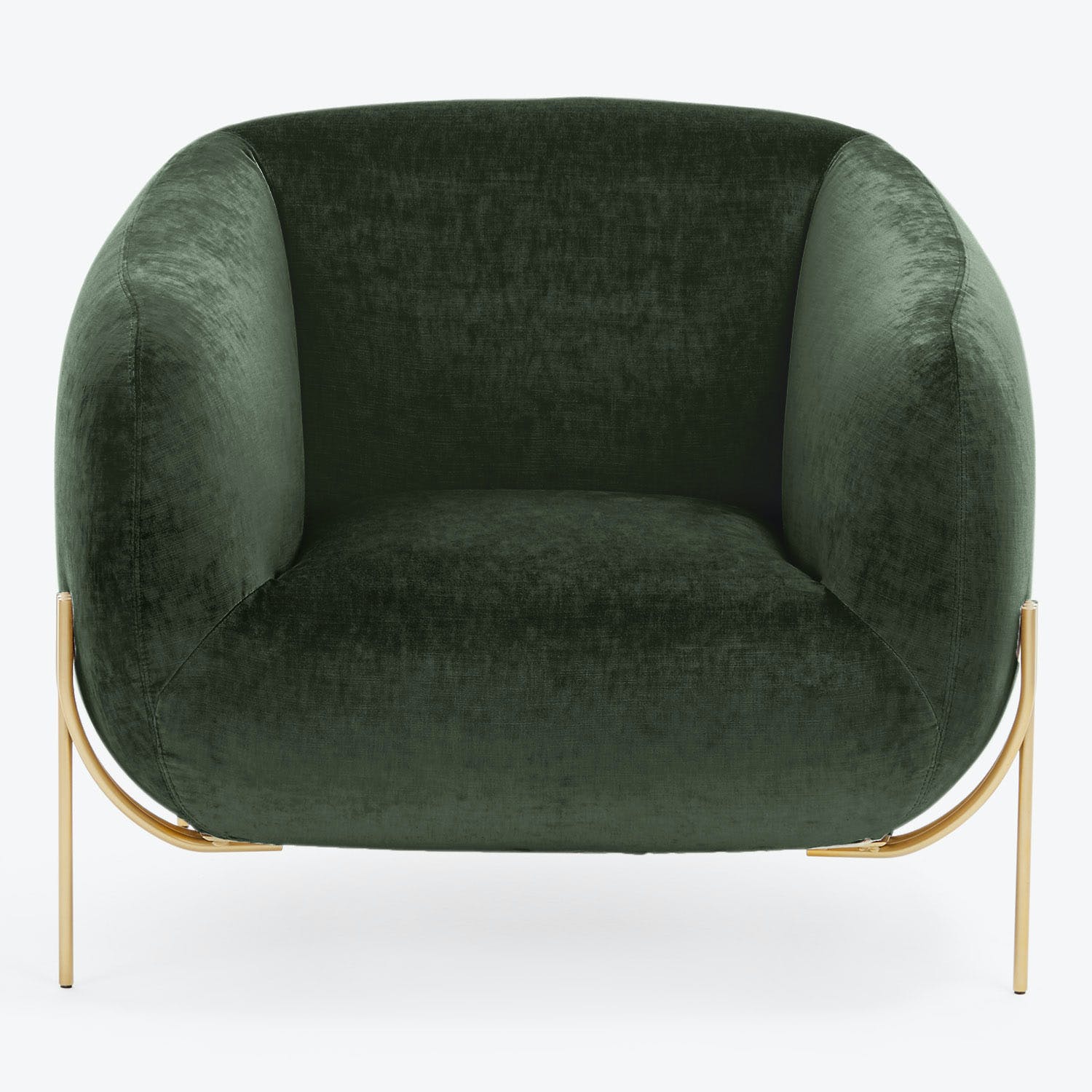 Modern armchair with velvet upholstery in rich, dark green color.