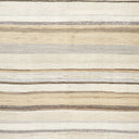 Close-up of textured surface with striped pattern resembling wood grain.