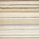 Varied wood grain pattern with horizontal stripes in earthy tones.