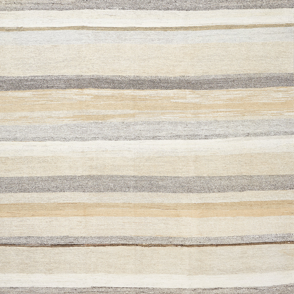 Close-up of textured material with horizontal stripes in neutral colors.