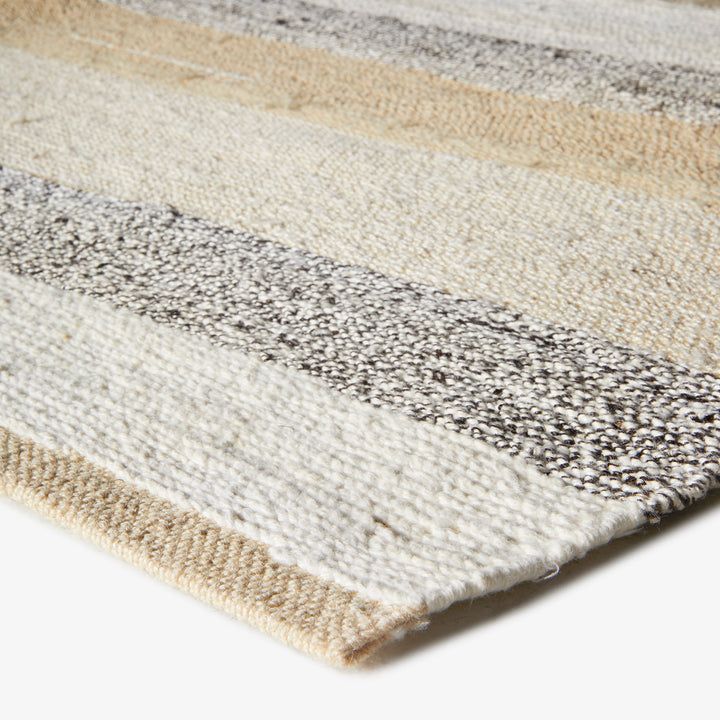 Close-up of a plush, high-pile rug with modern Scandinavian design.
