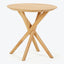 Minimalist wooden table with three legs and round tabletop.