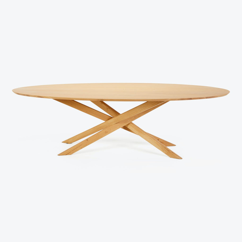Sleek and minimalist wooden table with X-shaped base, perfect for modern interiors.