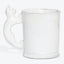 Unique cat-shaped handle adds a playful touch to white mug.