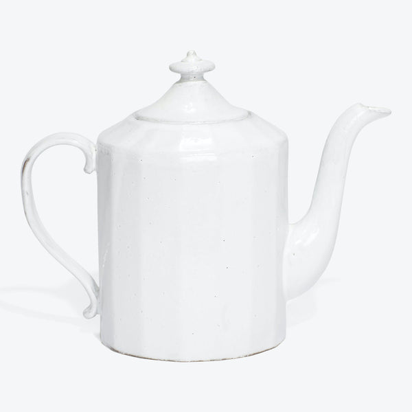 White enamel teapot with classic shape and speckled surface.