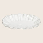 Exquisite ceramic dish with scallop edges mimicking bivalve shell