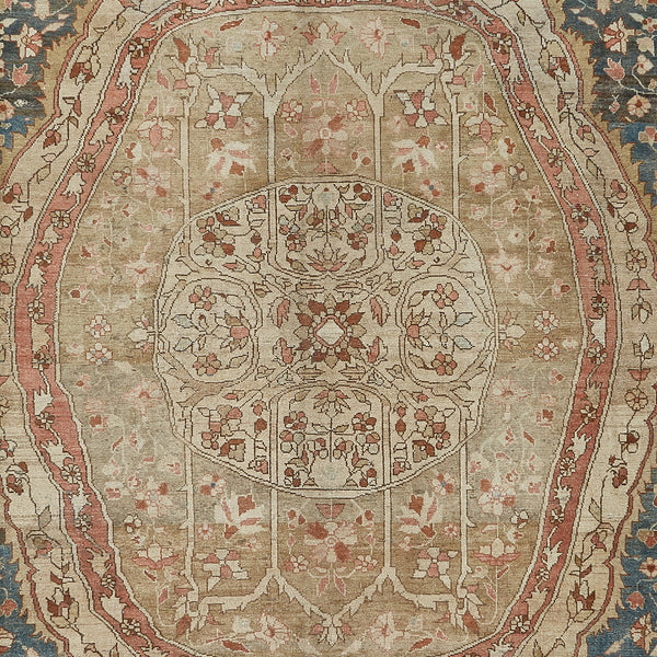 Exquisite Persian rug with intricate floral patterns and vintage charm.