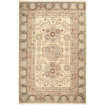 Traditional rug with intricate floral and geometric design in earth tones.