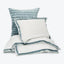 Harmoniously designed bed set featuring luxurious textures and calming colors.