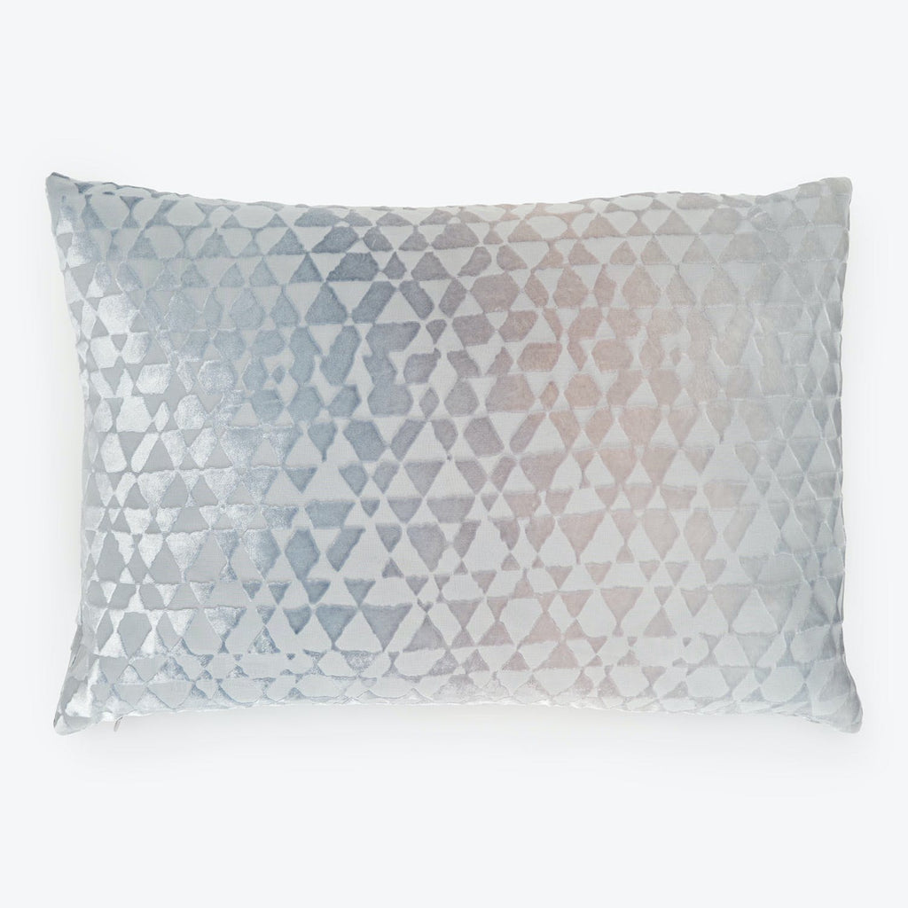 Rectangular pillow with gradient diamond pattern in silvery blue-gray tones.