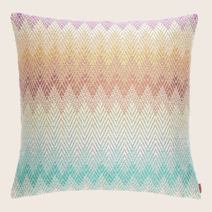 Vibrant and cozy decorative pillow with textured chevron pattern.