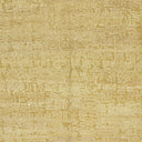 Close-up of a richly textured golden fabric with subtle pattern