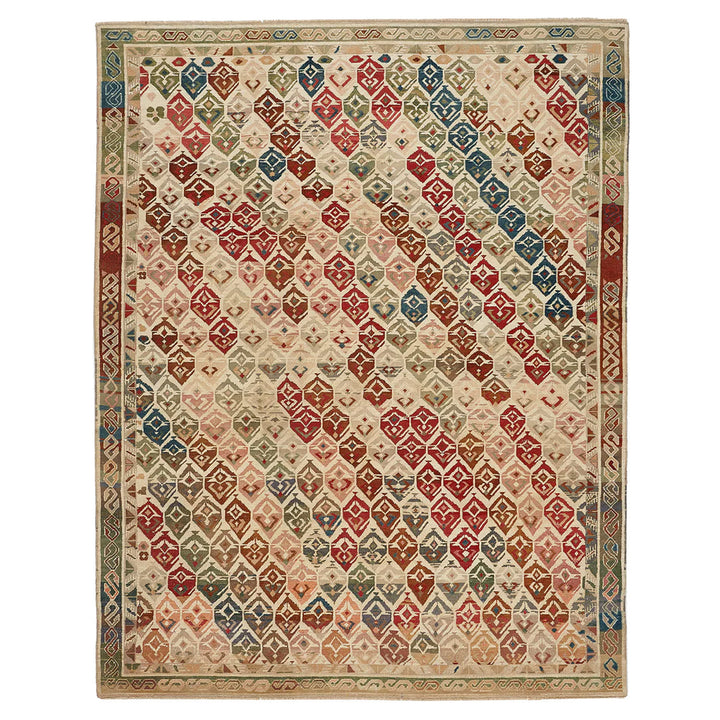 Elaborately patterned vintage rug with diamond motif and intricate details.