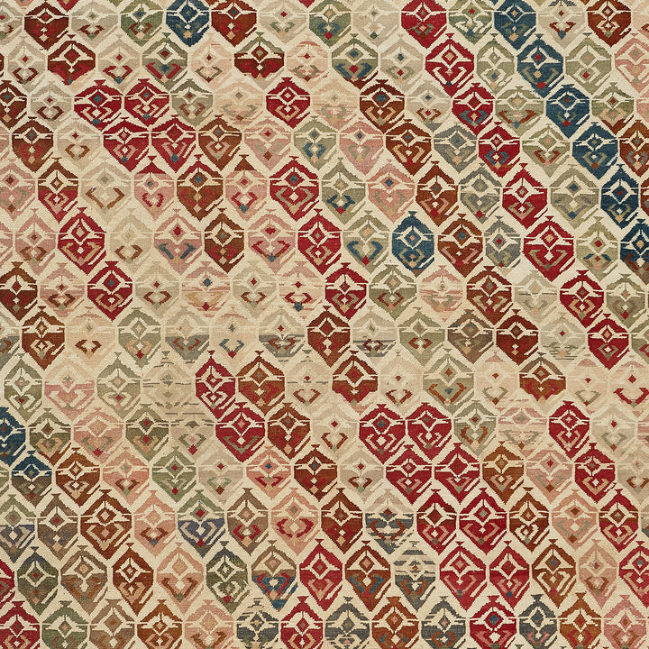 Intricate geometric rug pattern showcases rich Middle Eastern craftsmanship.