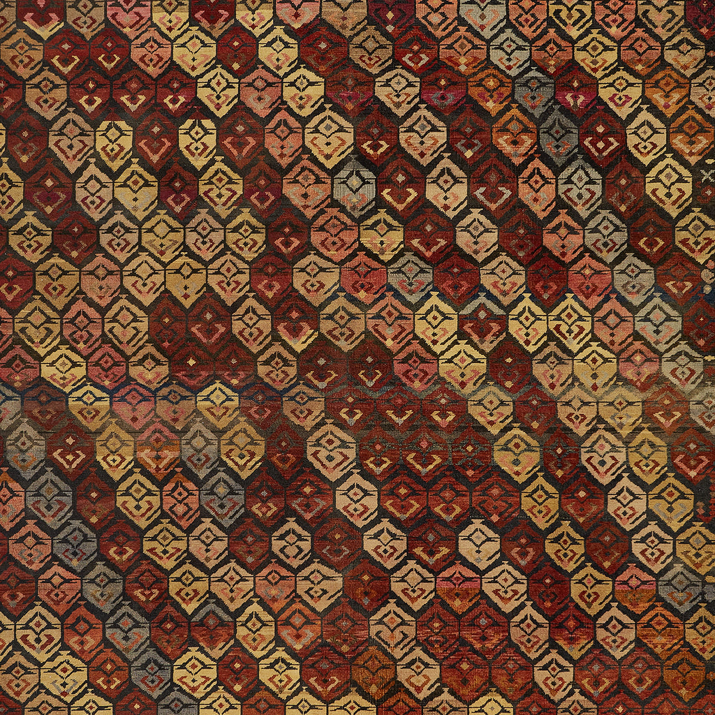 Woven fabric or carpet with geometric Middle Eastern-inspired design.