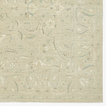 Delicate vine-like pattern in muted tones on fine fabric
