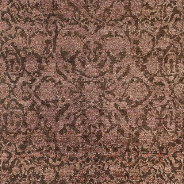 Intricate, classical patterned textile in brown tones with antique charm.